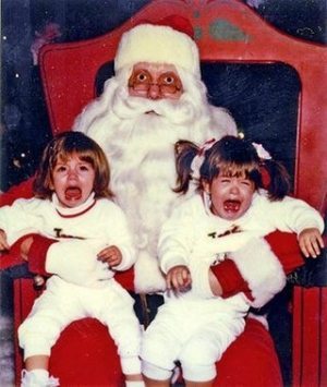 two little girls crying in christmas picture
