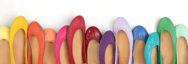 row of colorful Tieks shoes