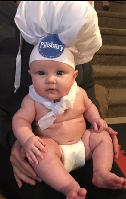 baby dressed as pilsbury dough boy