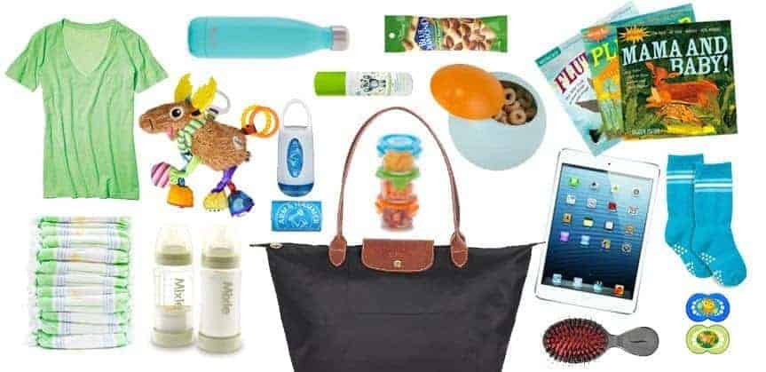 itemized list of things to pack in your handbag when flying with a baby