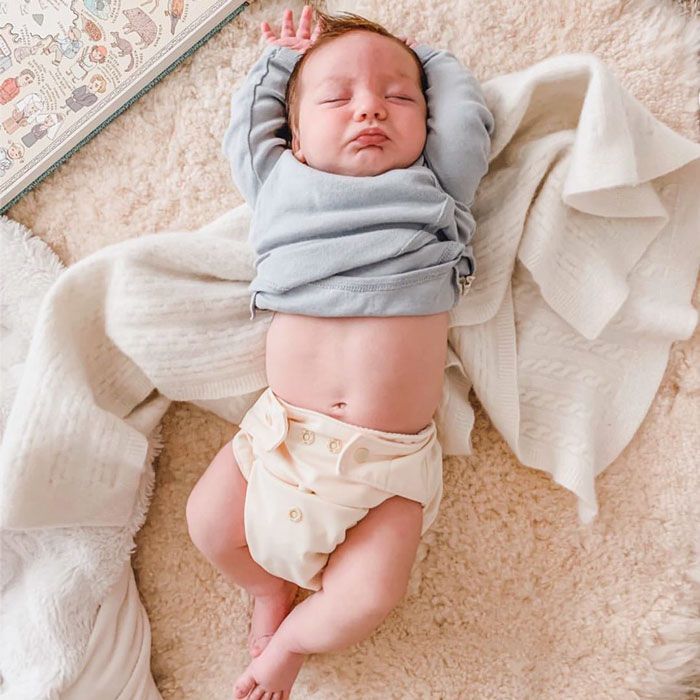 baby asleep in a GroVia organic diaper