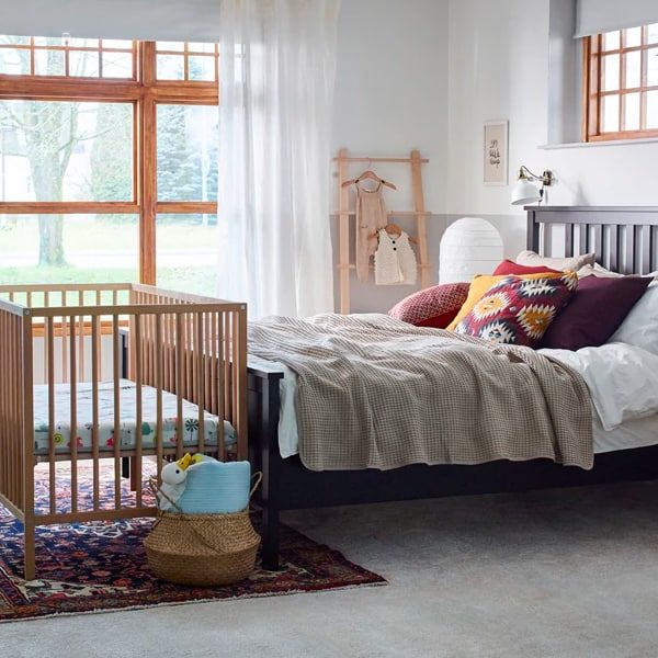 Bedroom with hotsell crib and bed