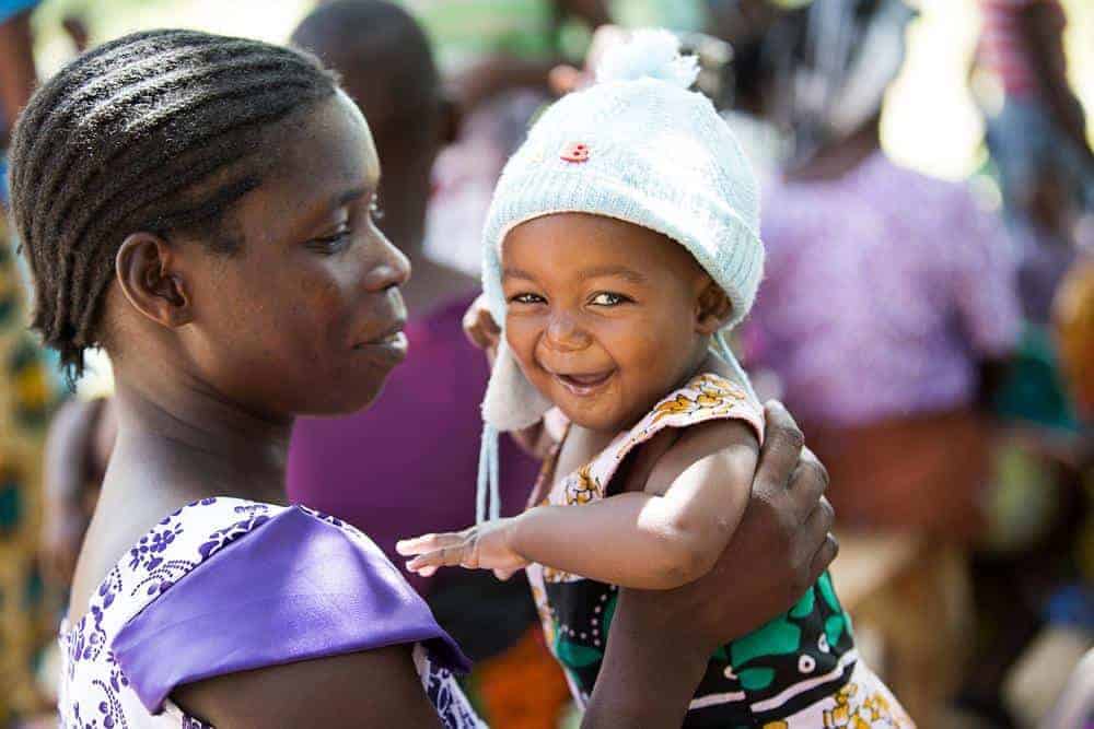 woman holding her baby