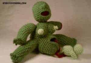 green zombie birthing doll
