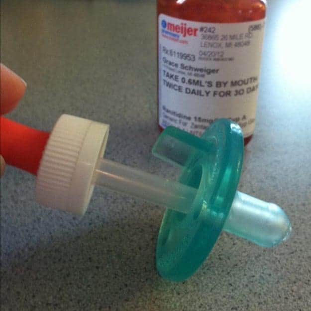 medication dropper inserted in a soother
