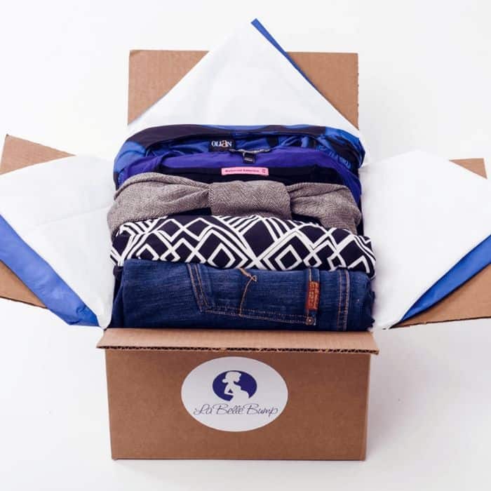 La Belle Bump box open showing selection of blue jeans and patterned tops