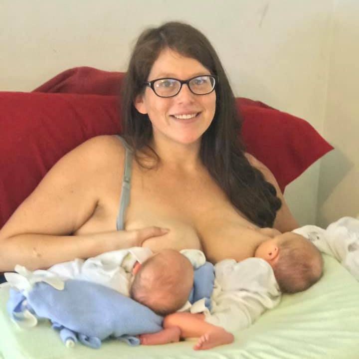 new mom breastfeeding her twins