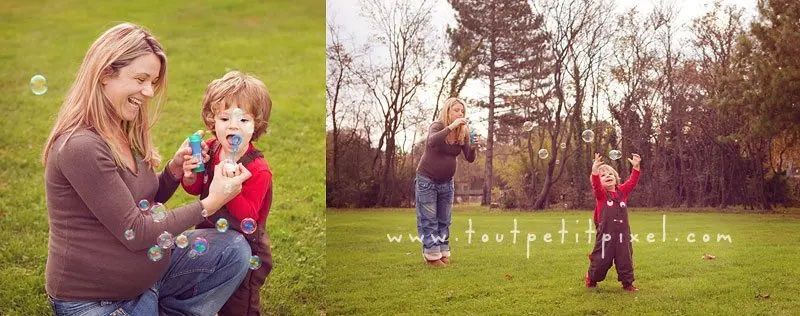 mom and toddler outside blowing bubbles