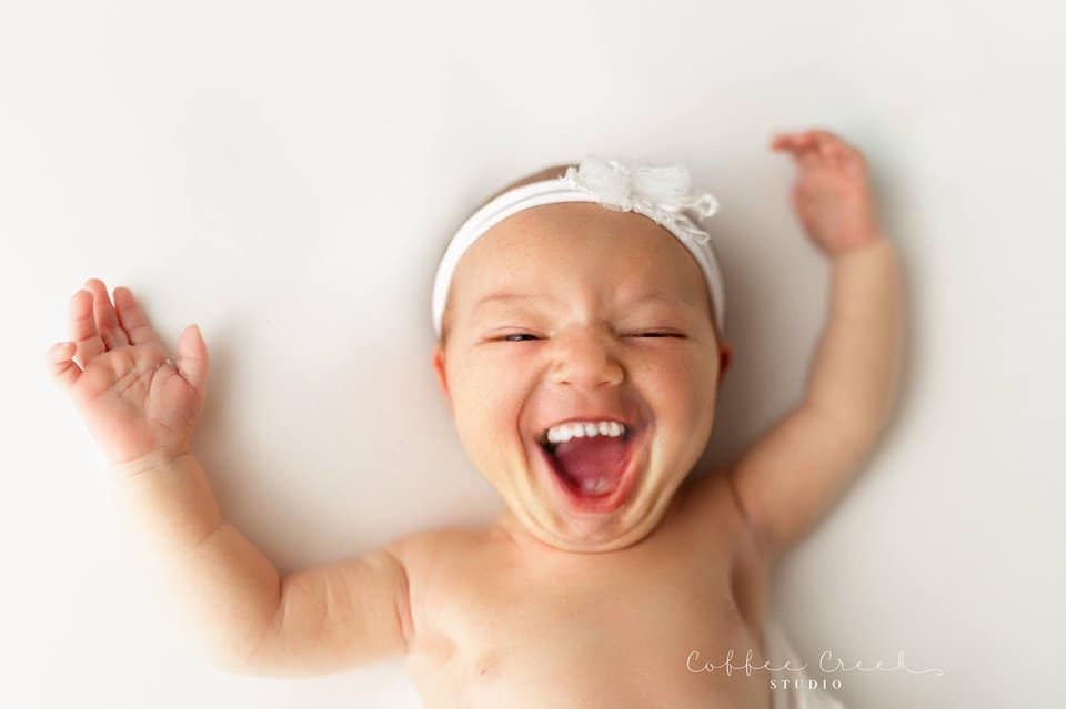 newborn baby with teeth photoshopped in.