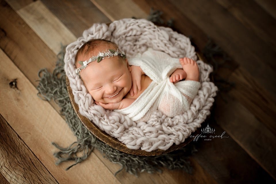 newborn baby with teeth photoshopped in.