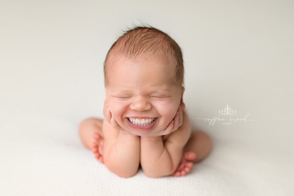 newborn baby with teeth photoshopped in.