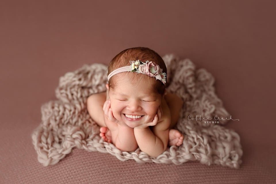 newborn baby with teeth photoshopped in.