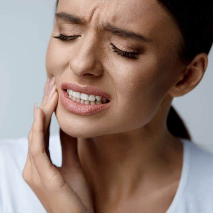 woman with sore gums