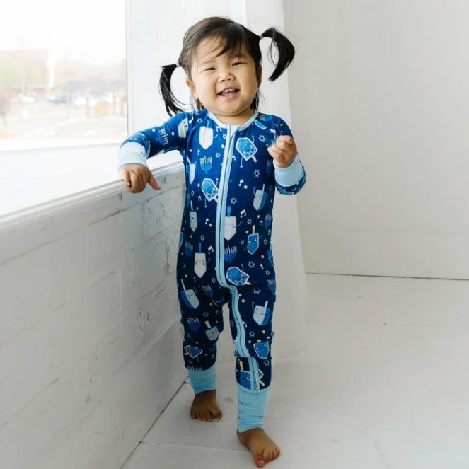 toddler wearing holiday Hannukah pajamas