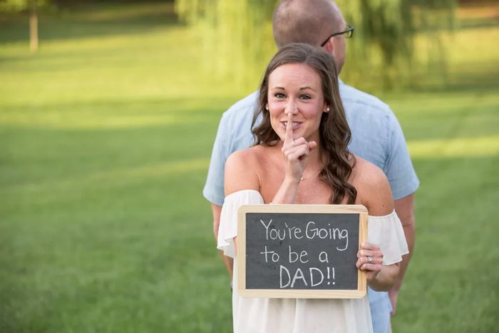 pregnancy announcemnt maternity photo shoot with 'you're going to be a dad' secret