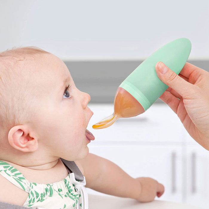 baby eating with boon spoon