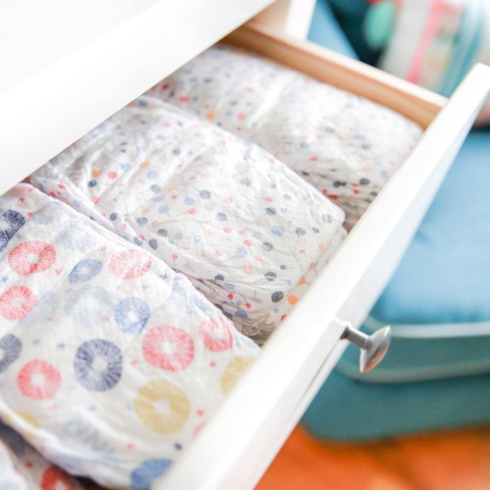 drawer filled with diapers at grandparent's house