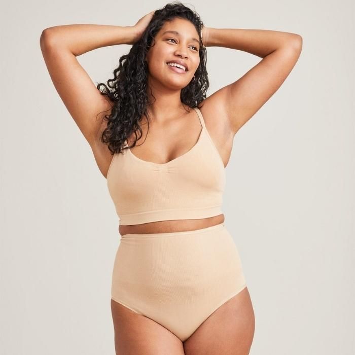 woman wearing light beige compression underwear