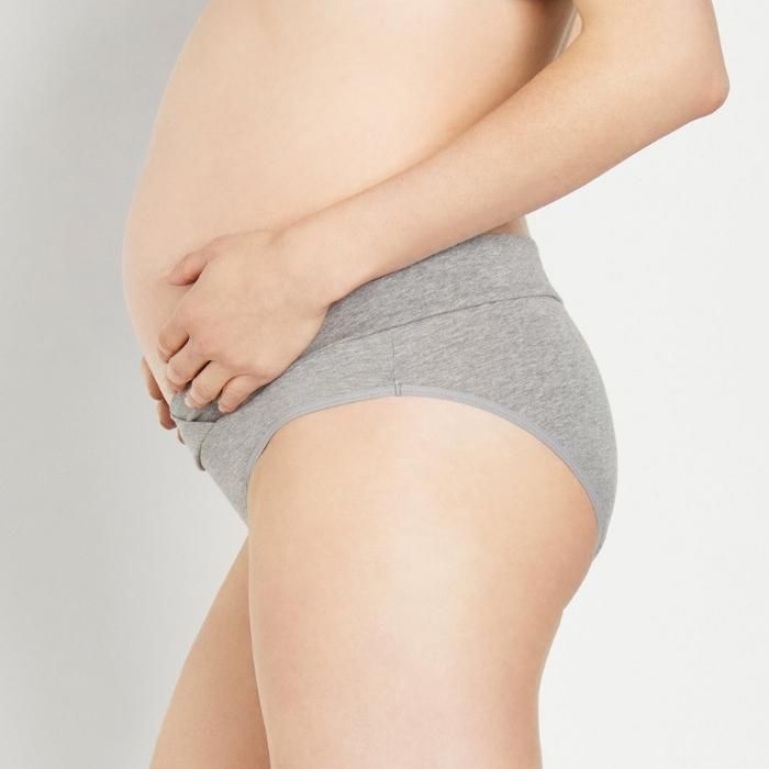 pregnant woman wearing gray maternity underwear