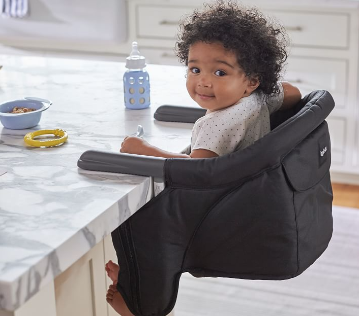 baby sitting in Inglesina Fast Table Chair