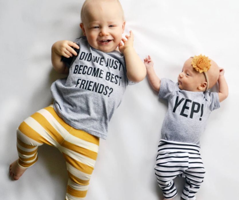 Toddler and baby in a Did We Just Become Best Friends? Yep! t-shirt set