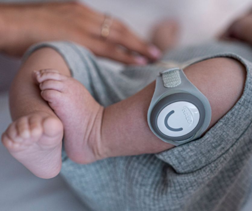 Halo SleepSure monitor on a baby's leg close up