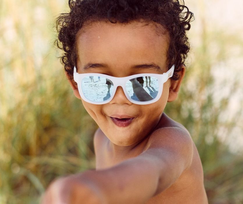 toddler wearing babiator sunglasses