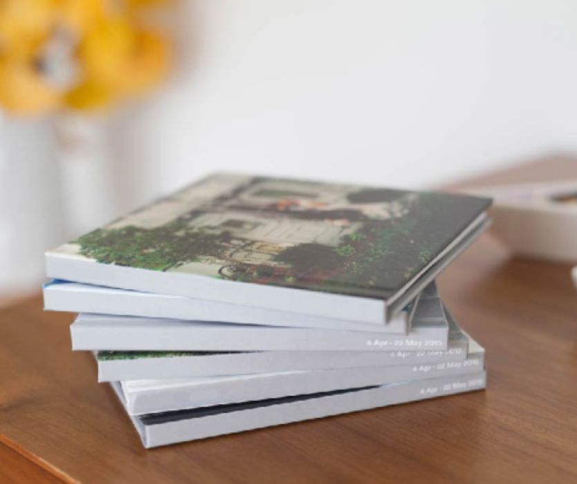 stack of tinybeans photo books