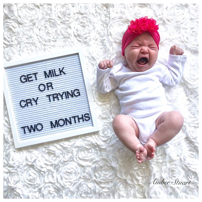baby crying next to letterboard that says, get milk or cry trying quote