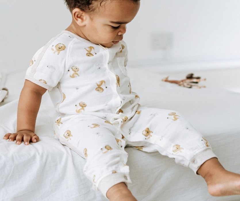 little boy wearing nest design canada pajamas
