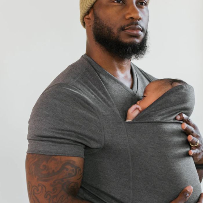 man holding newborn in a grey dad shirt from lalabu