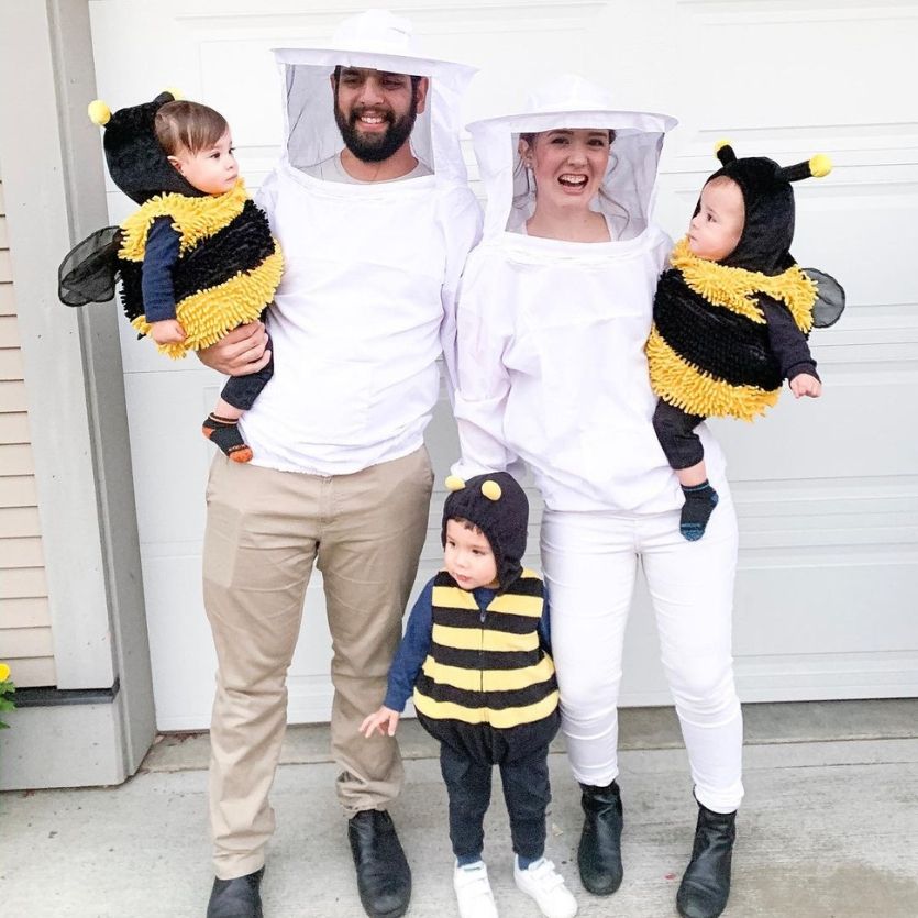 family costume of bee keepers with kids as bees