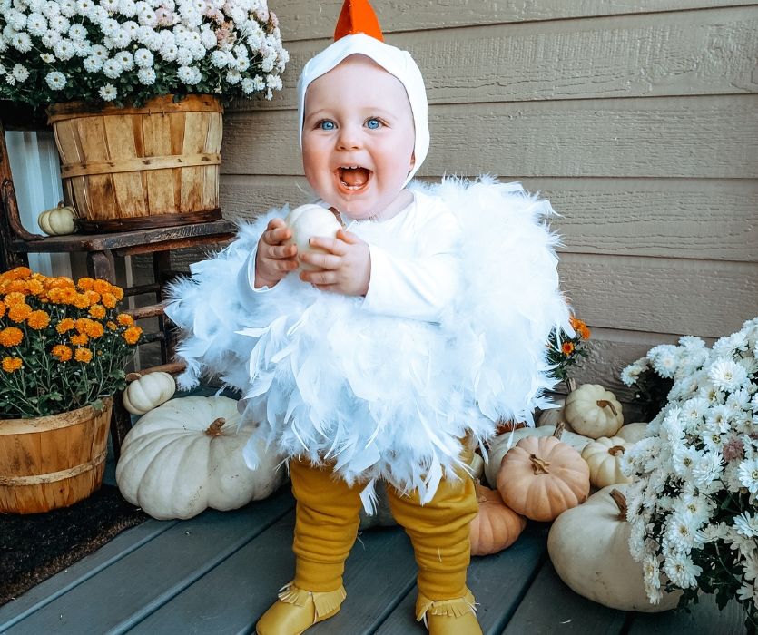 toddler dressed in easy diy baby chicken costume