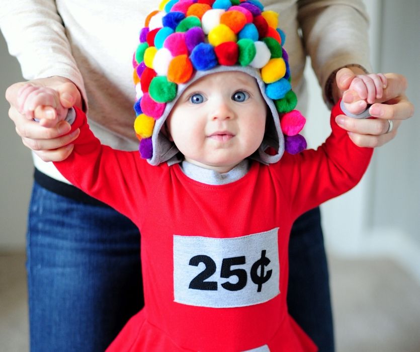 baby dressed as a gumball machine