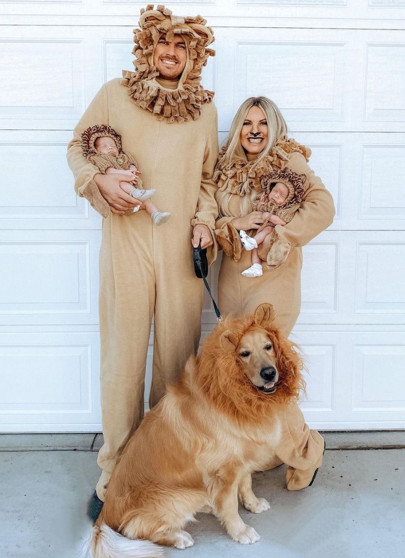 couple with baby and dog dressed as lions for halloween