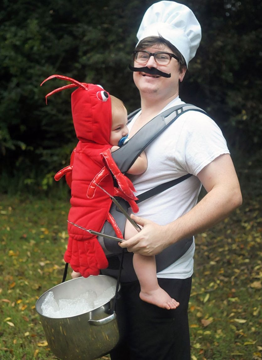 baby wearing costume of lobster and chef