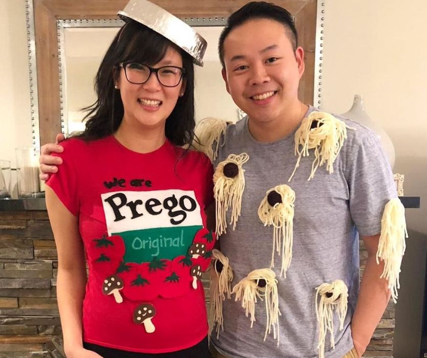 couple announcing their pregnancy with halloween were preggo costume