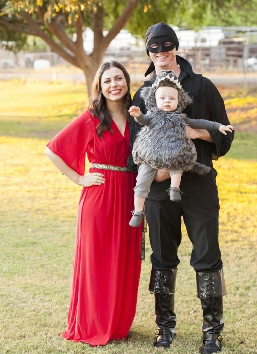 mom and dad with baby dressed in Princess Bride family costumes