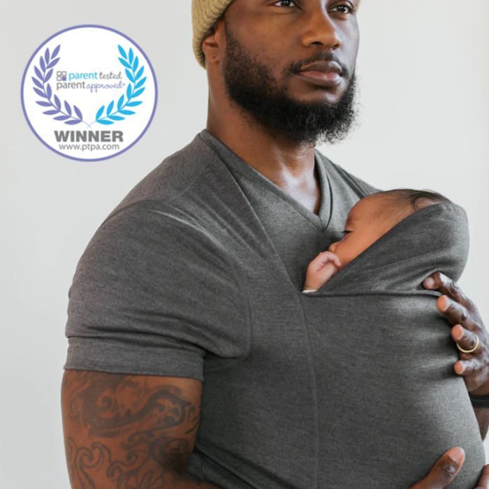 man holding newborn in a grey dad shirt from lalabu