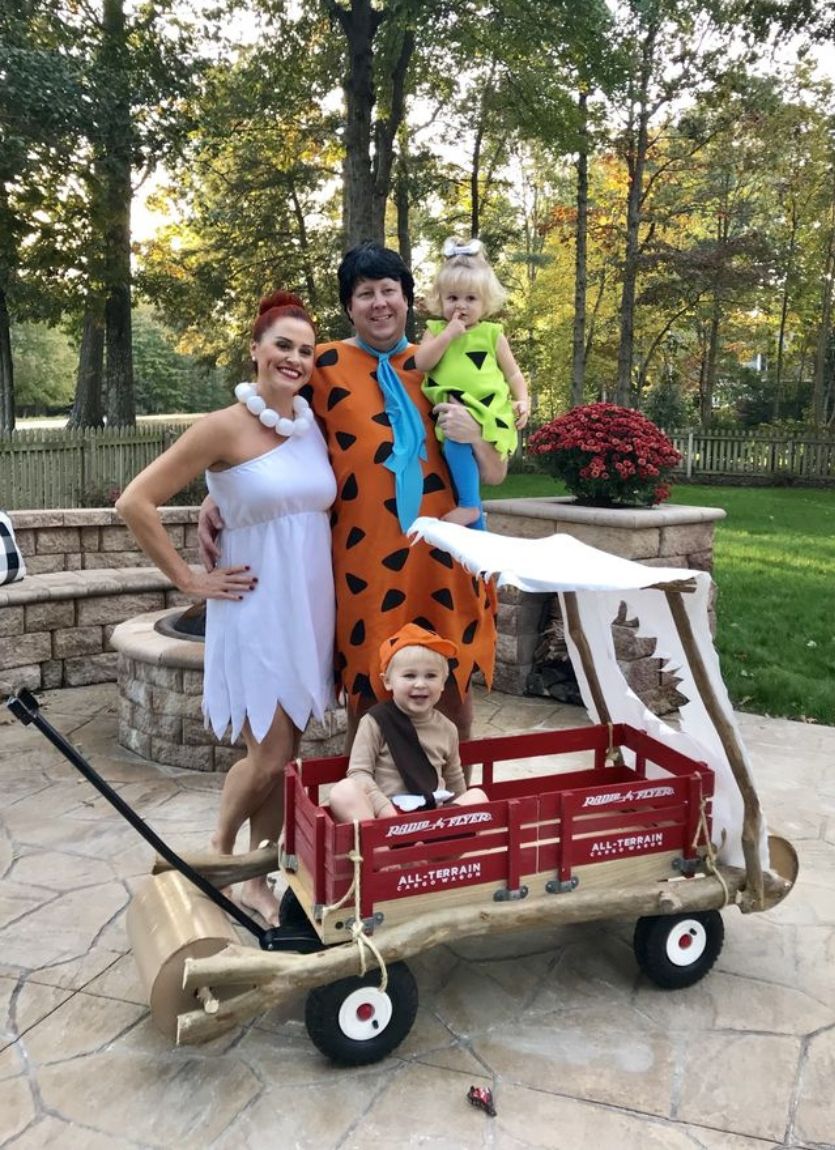 Flintstones family halloween costume with wagon