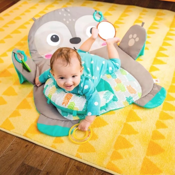 baby having tummy time on Bright Starts Tummy Time Prop & Play Mat