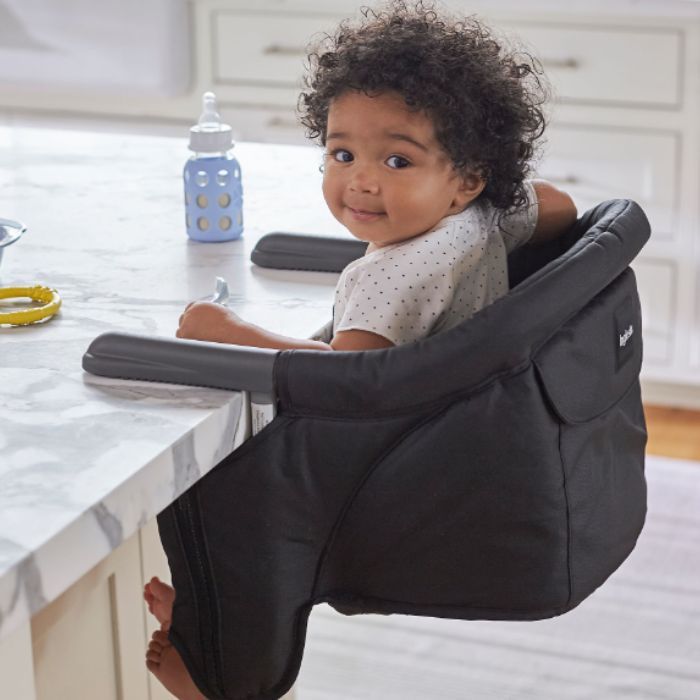 baby sitting in Inglesina Fast Table Chair