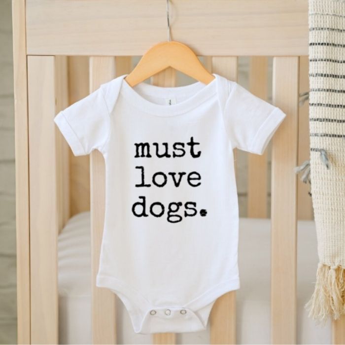 https://pregnantchicken.com/content/images/2023/10/Must-love-dogs-baby-onesie.jpg