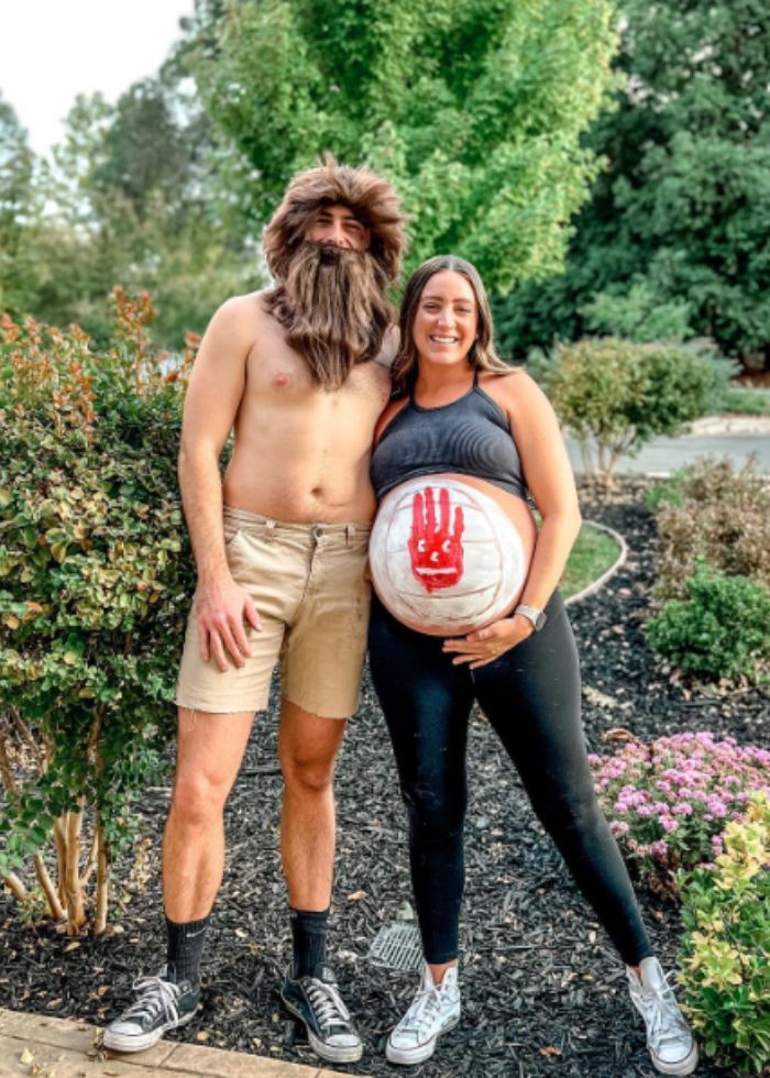 castaway couple halloween costume with volleyball pregnancy belly