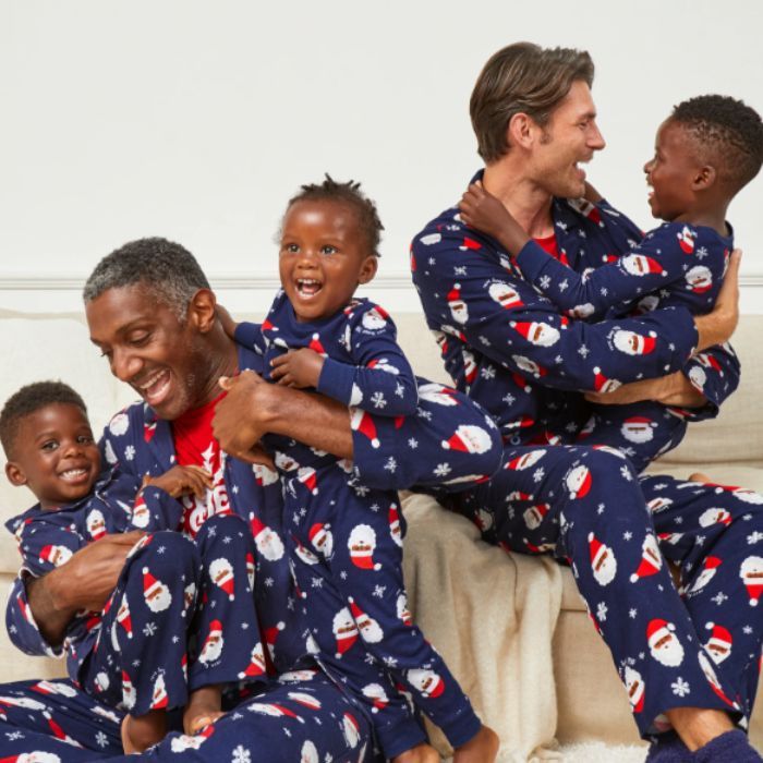 family wearing old navy family snowmen pajamas