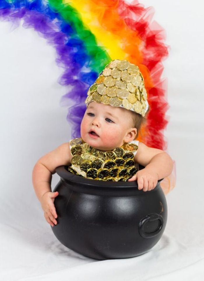 Baby in a pot of gold photo rainbow background