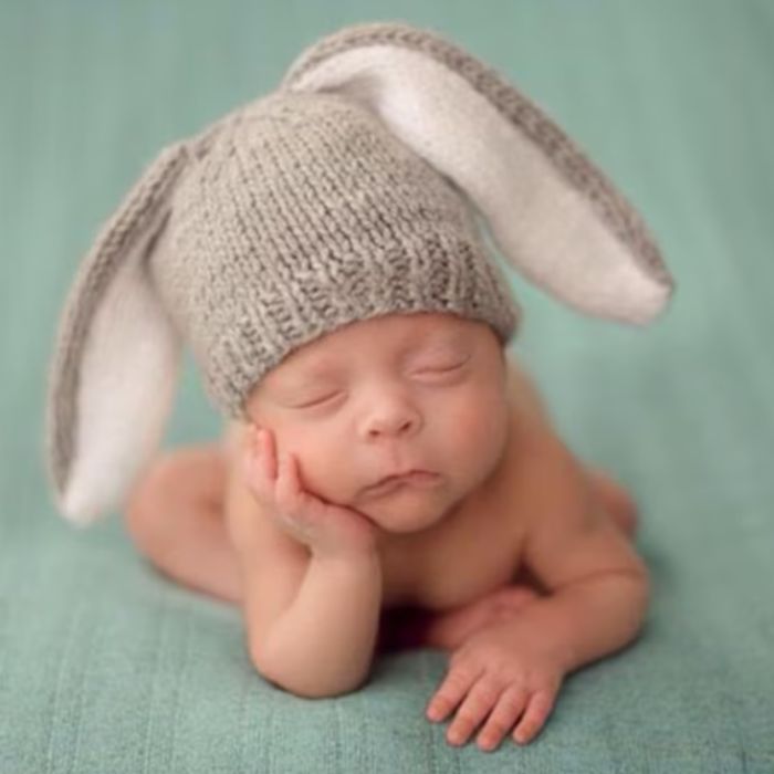 baby in a knitted bunny hat