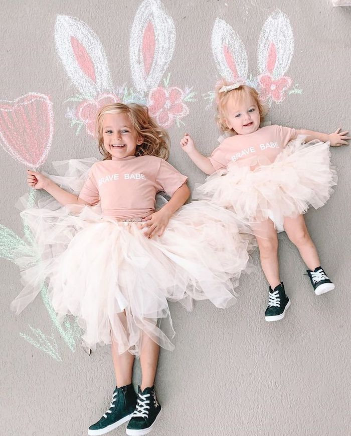 Kid and toddler Easter photo matching tutus with chalk drawing bunny ears and flowers
