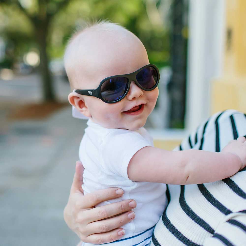 baby wearing sunglasses in the summer