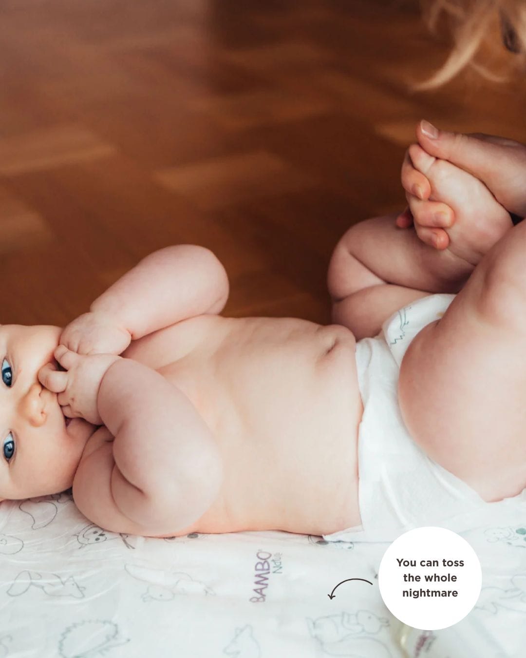 baby on a disposable change pad